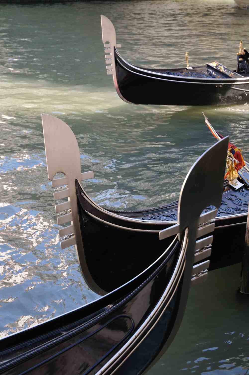 History of gondola iron prow (Photo by Gérard GRIFFAY on Unsplash)