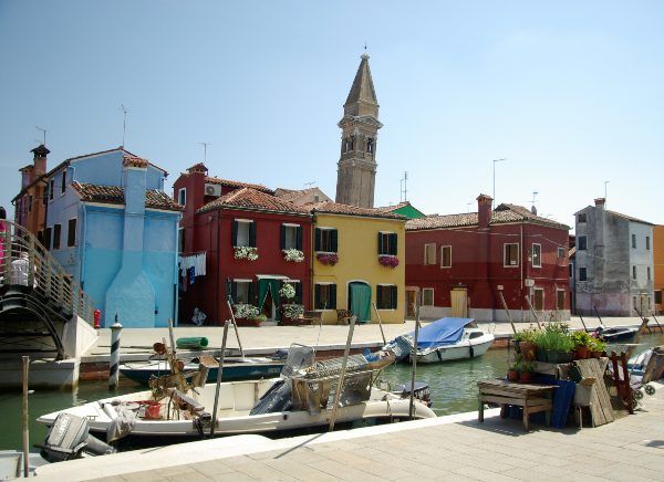 the church of san martino and the leaning tower - https://get.pxhere.com/photo/town-city-vehicle-plaza-italy-tourism-waterway-bell-tower-channel-burano-island-colorful-houses-767724.jpg