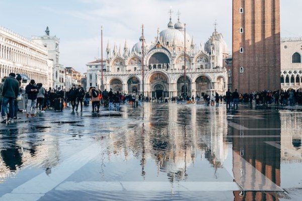 when acqua alta occurs in venice - Photo by Ljubomir Žarković on Unsplash